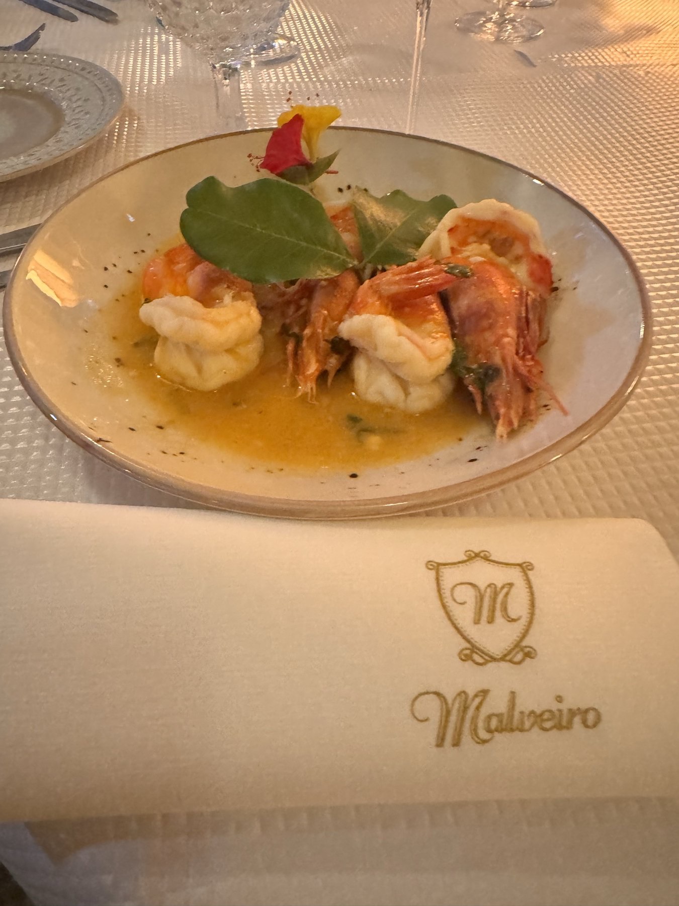 A giant Mozambique prawn in golden butter sauce